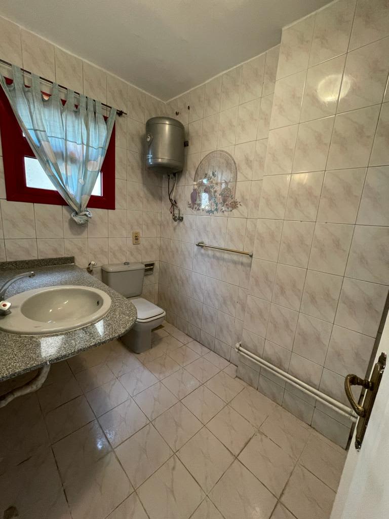 Elegant 3-Bedroom Apartment with Green Views