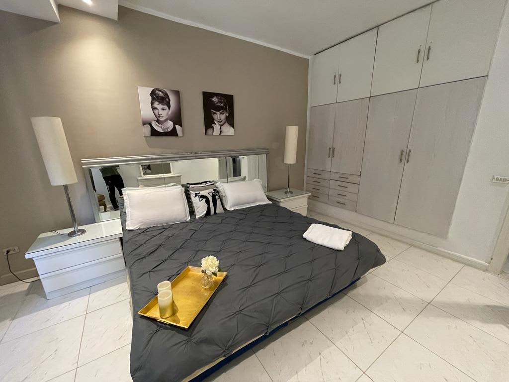 Bright 4-BR Apartment with Open Living Spaces