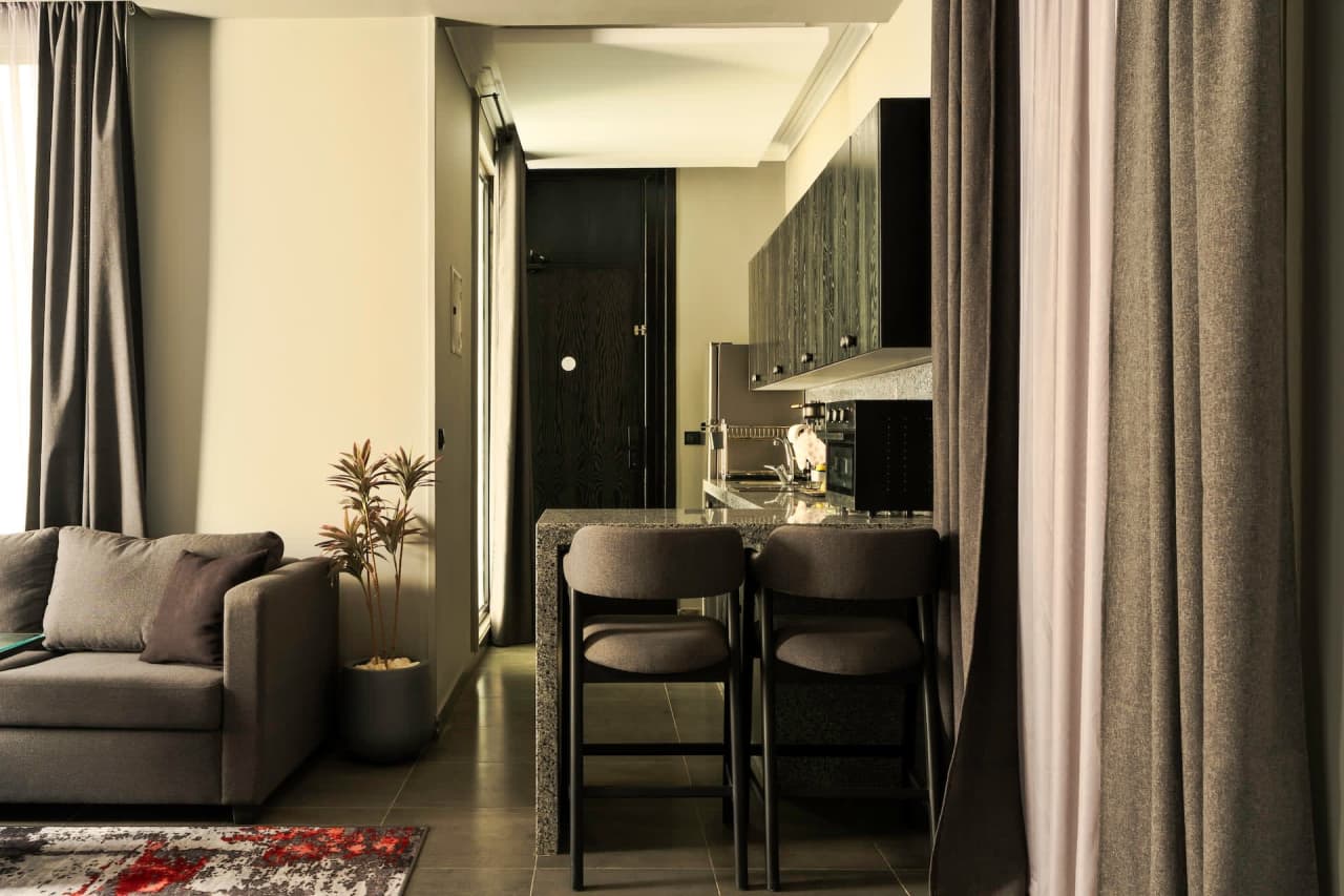 Modern 1BR in New Cairo with roof access — First New Cairo Qism