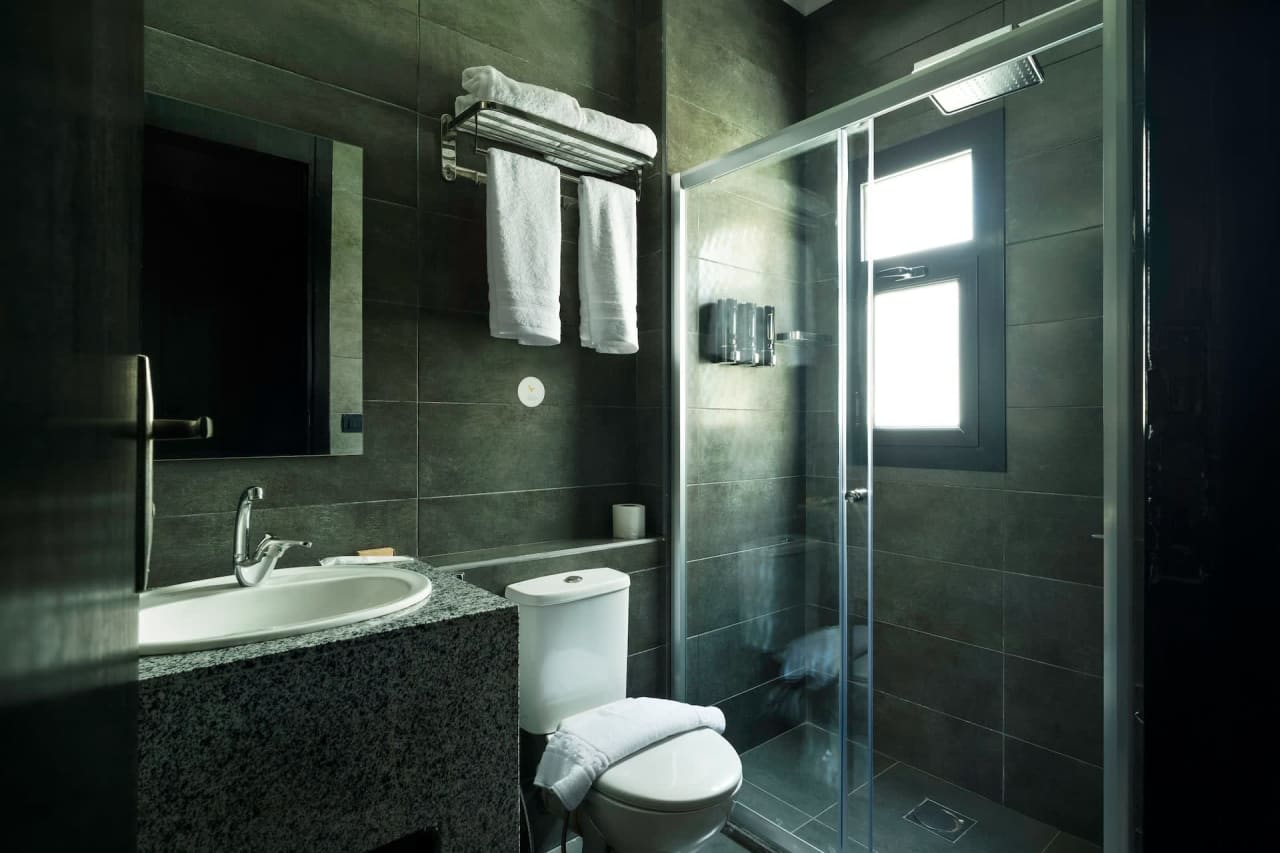 Modern 1BR in New Cairo with roof access — First New Cairo Qism