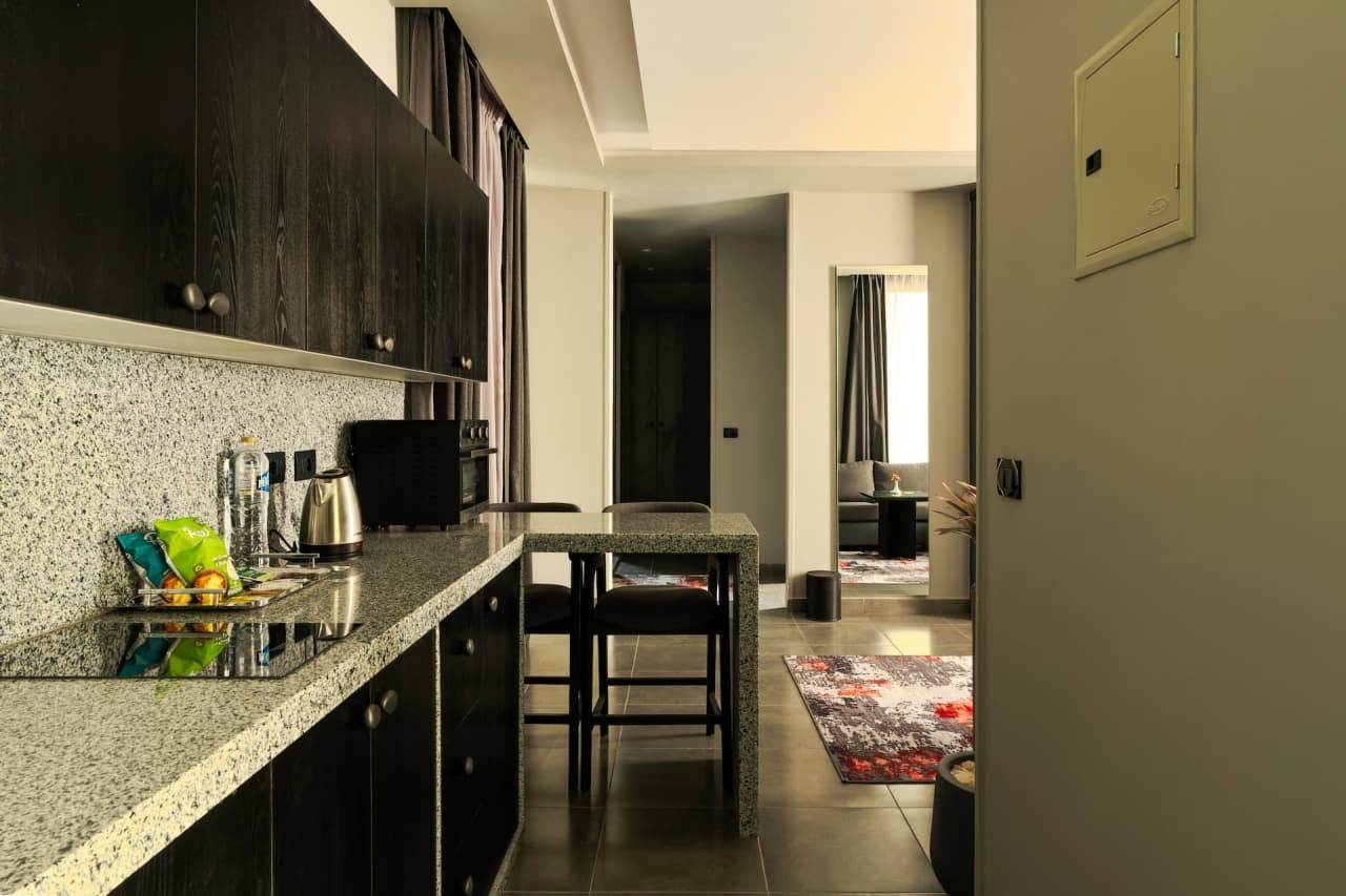 Modern 1BR in New Cairo with roof access — First New Cairo Qism