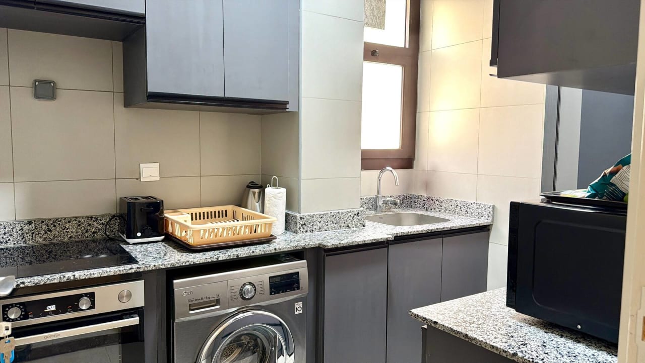 Modern 2BR in New Cairo with Balcony & gym access — First New Cairo Qism