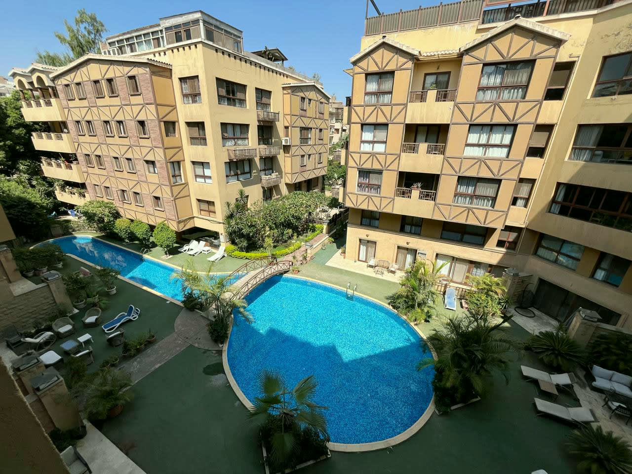 4BR Apartment with Pool & Garden Access in Prime Location