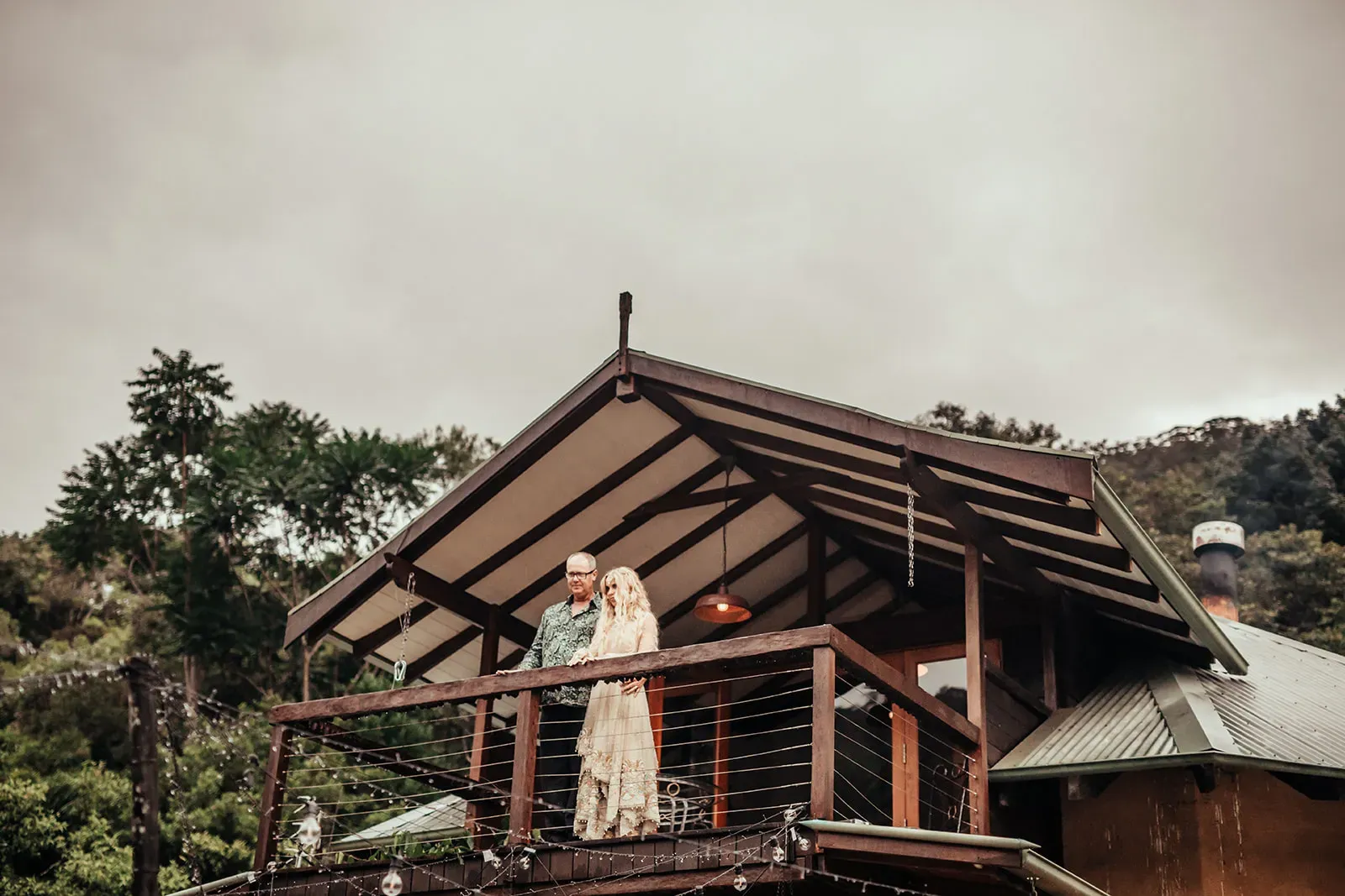 sally_mitch_real_wedding_table_flowers_pink_dahlias_brass_vase_wedlii_f6a4cdab6a