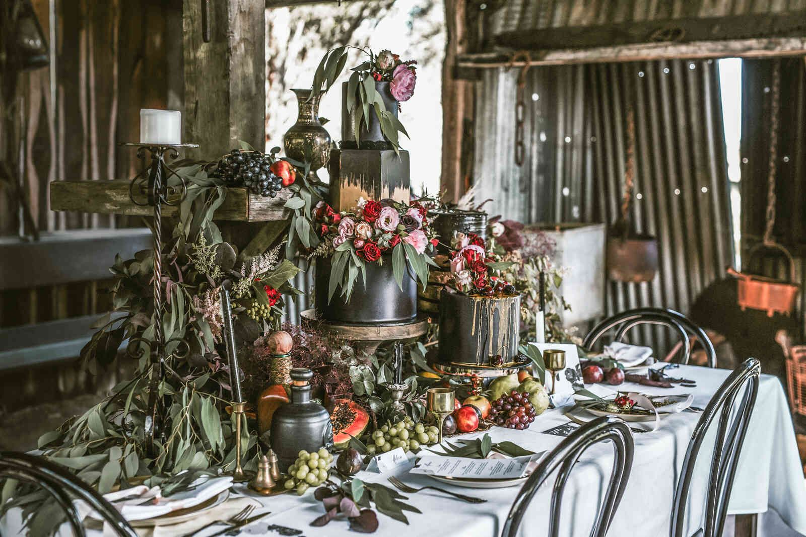 rustic_barn_reception_table_black_chairs_f1ebbc1b50