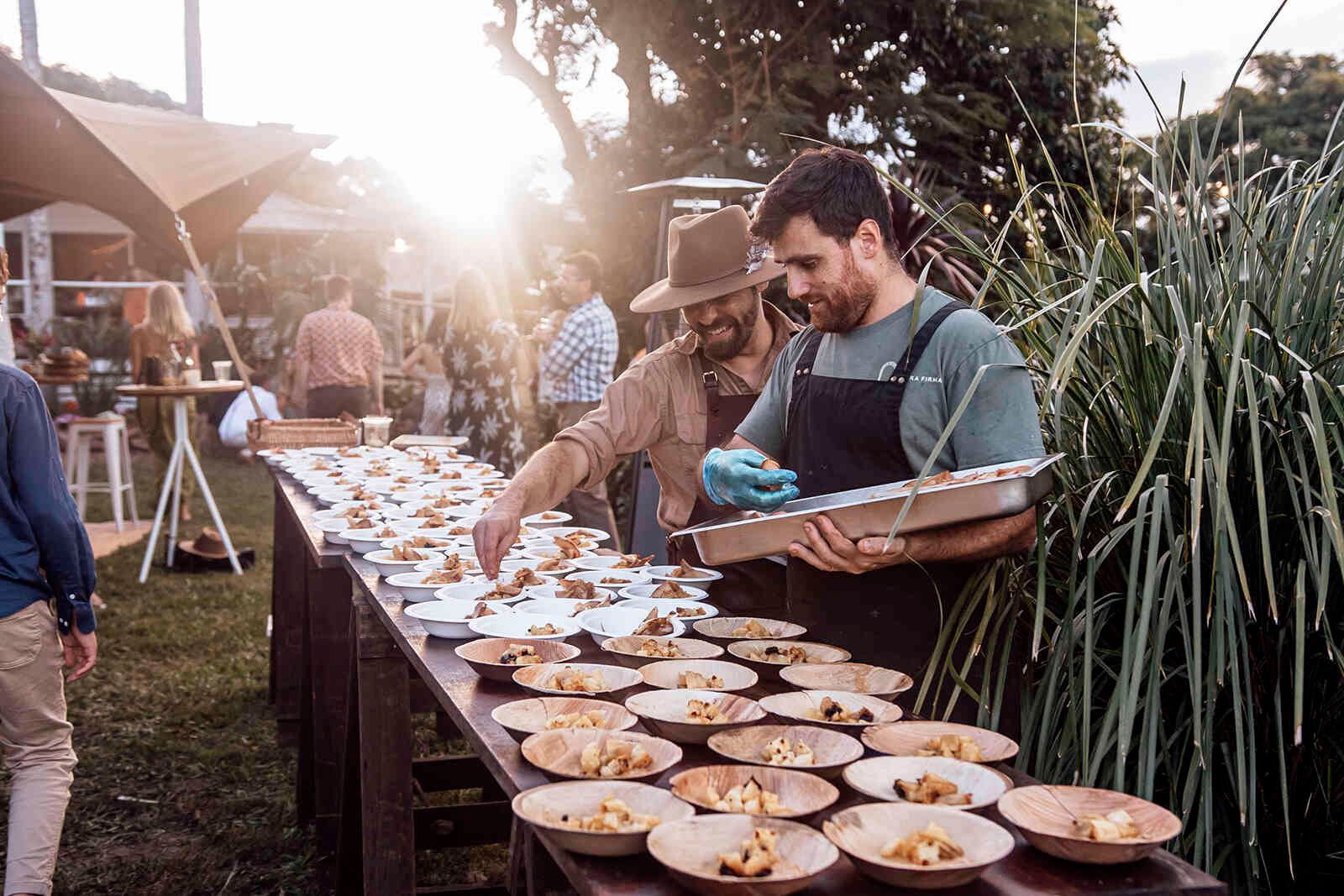 wedding_caterers_plating_meals_outdoor_reception_service_ad3955935b