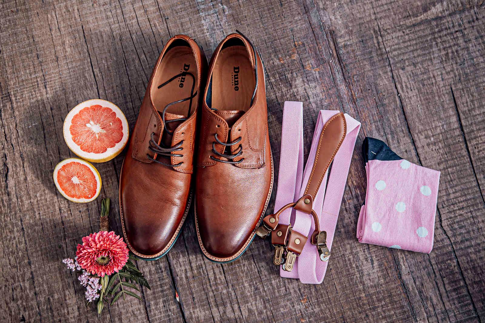 groom_accessories_flatlay_brown_shoes_pink_suspenders_e49ed30bbf