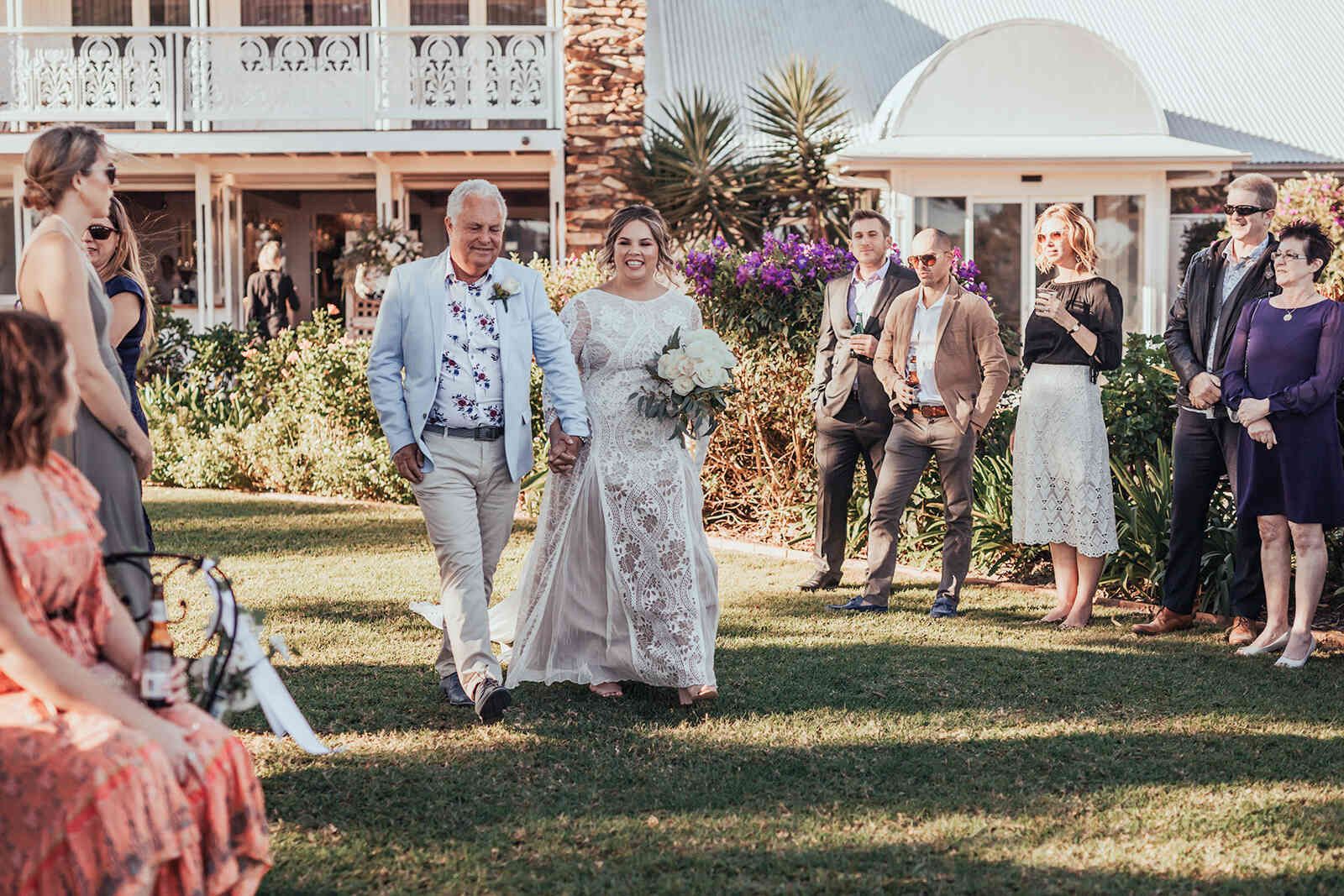 sarah_and_jeff_bride_sarah_walking_down_aisle_with_father_ceremony_1fc916f011