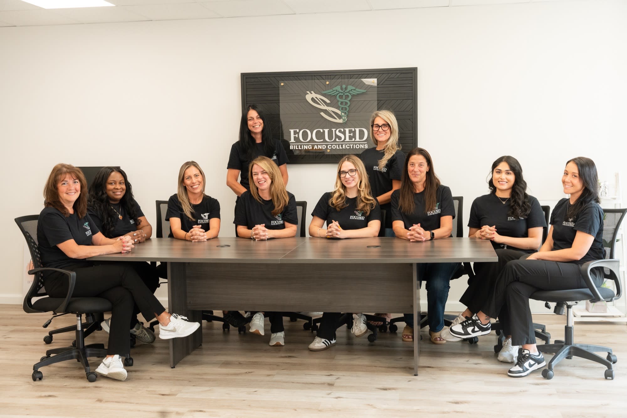Focused Billing Team at conference table