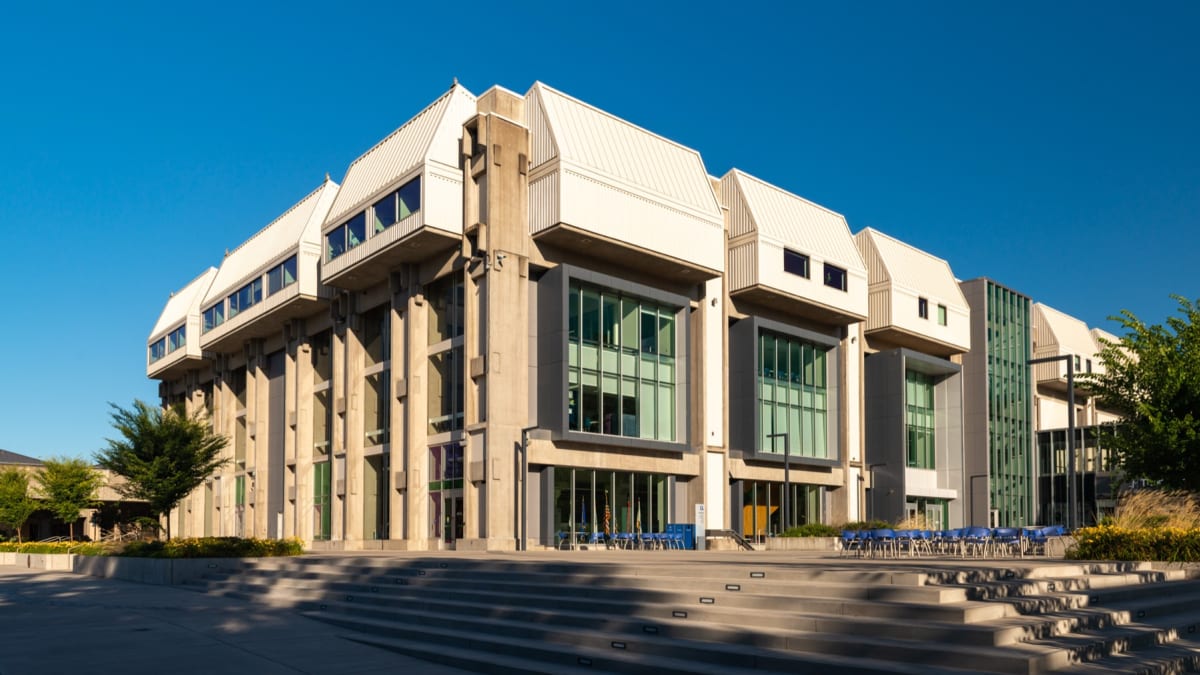 College campus building representing women’s flag football varsity program growth
