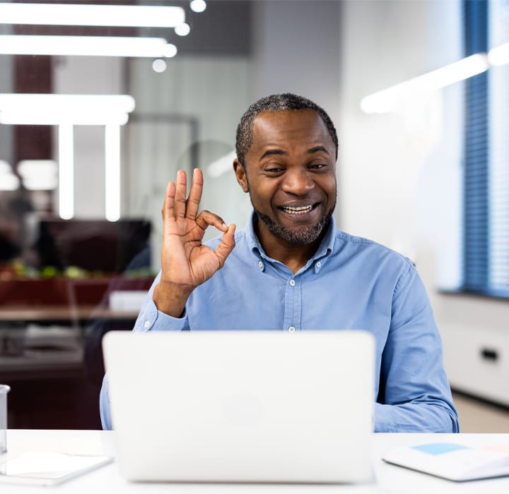 african bank employee helping customer modern branch digital banking technology