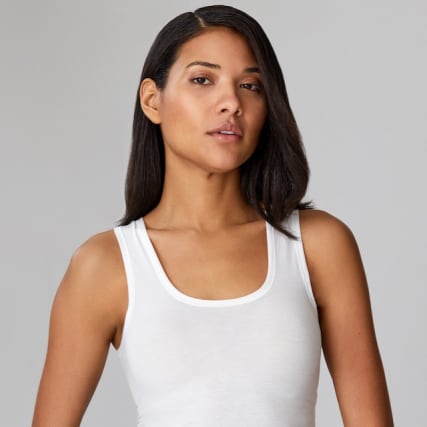 Glätte und Glanz für naturkrauses Haar.
