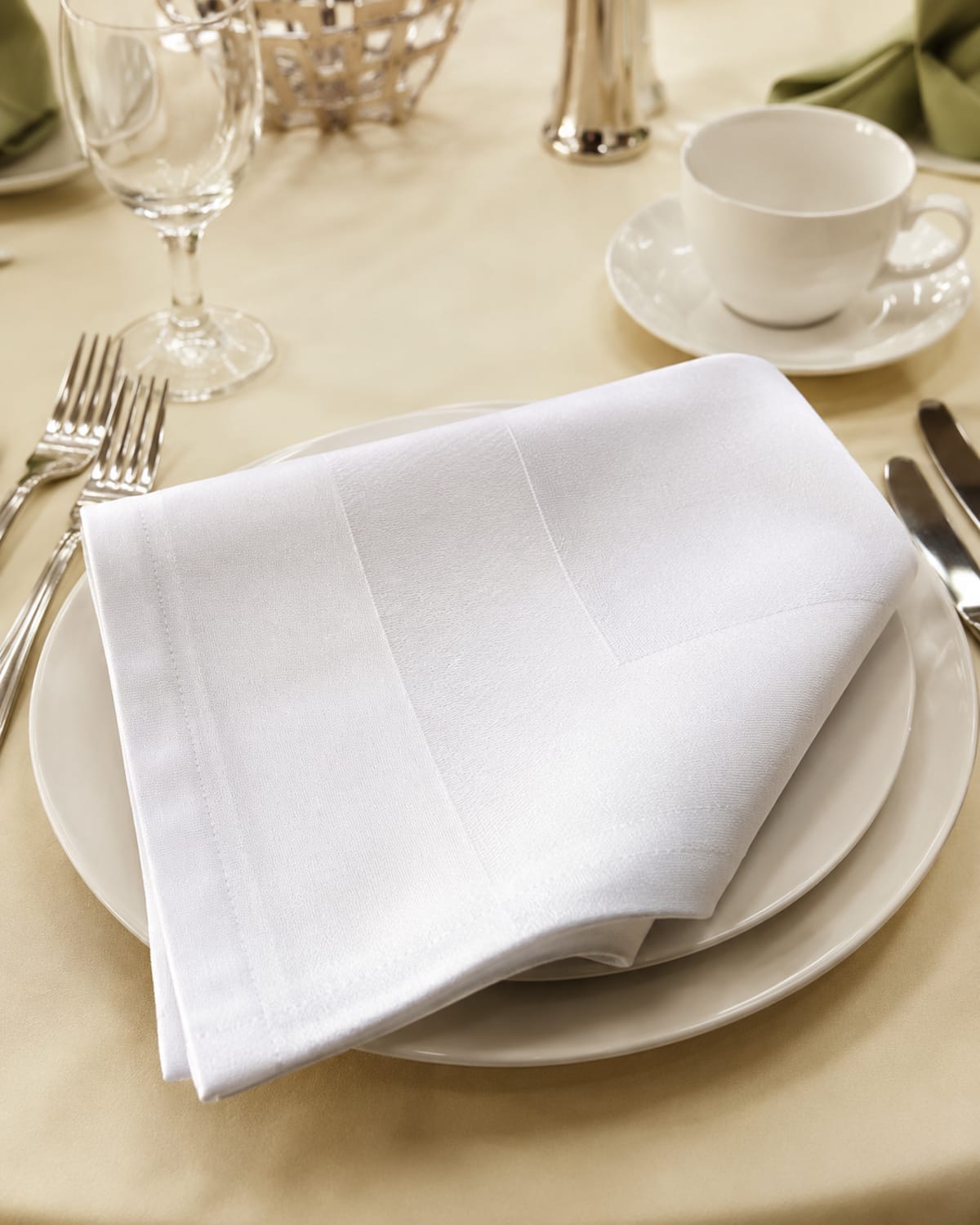 White satin-band napkin on plates