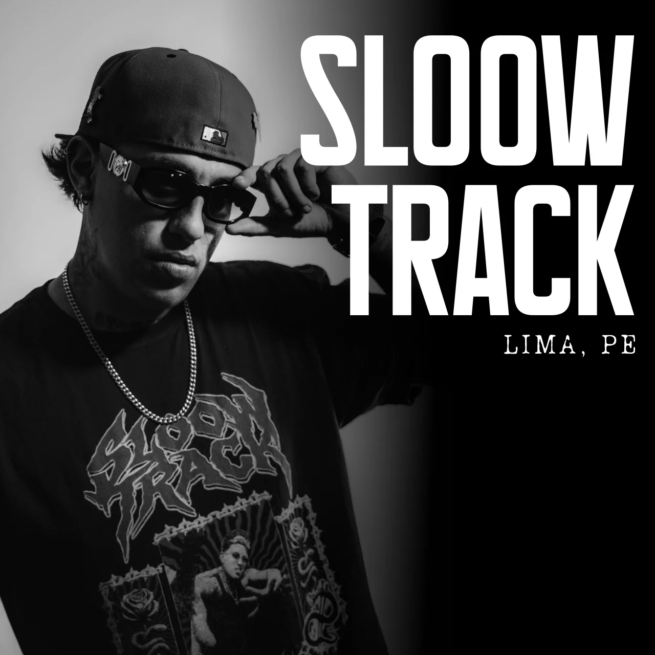 Retrato en blanco y negro de Sloowtrack, rapero y MC de Vato Fino Records