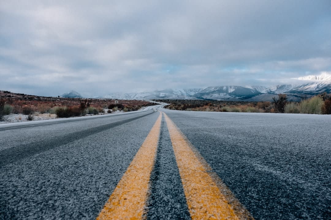A scenic road symbolizing the journey ahead for the automotive industry