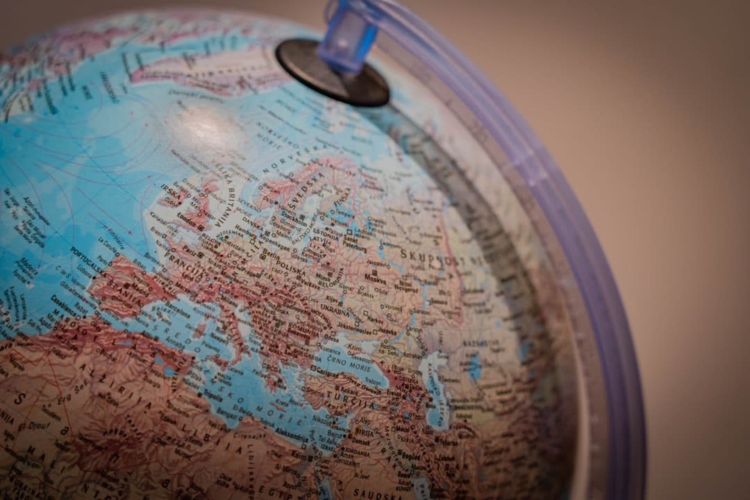 A world map with technology icons representing global trends