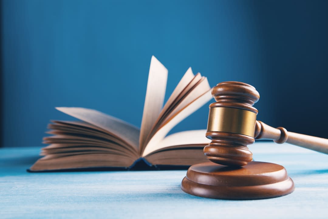 Close-up of legal documents with patent symbols