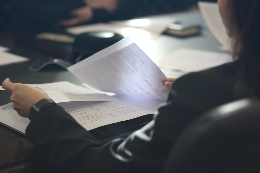 Close-up of legal documents with technology elements