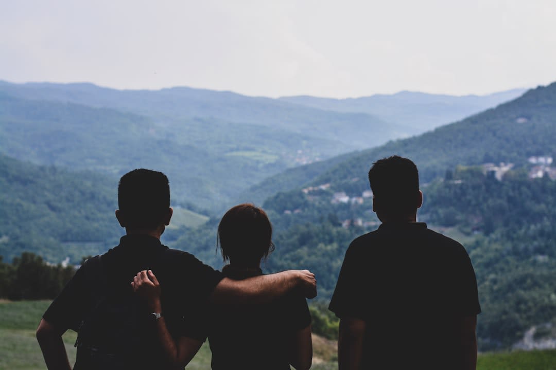 A group of people sharing memories in a digital setting