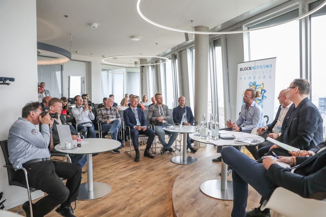Business professionals discussing venture capital investments
