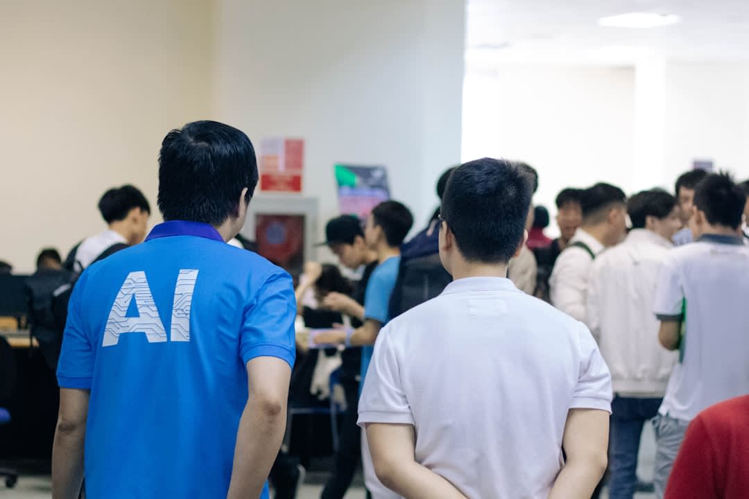 A diverse group of professionals discussing AI in a modern workspace