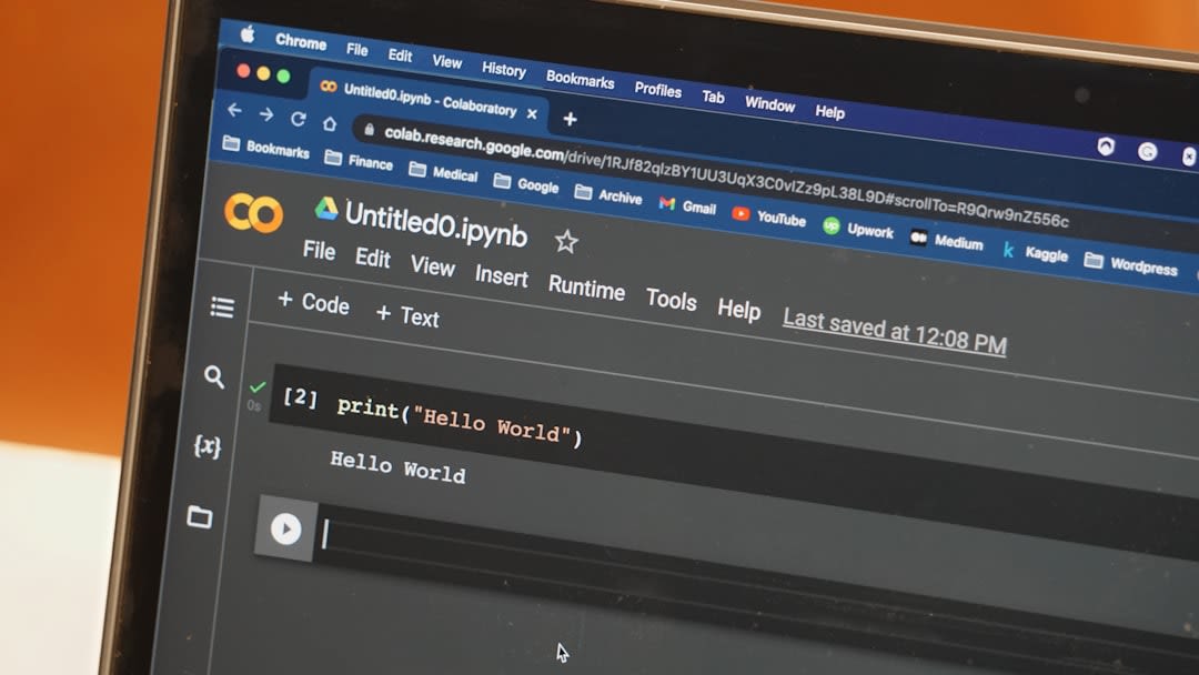 A person using open source software on a laptop