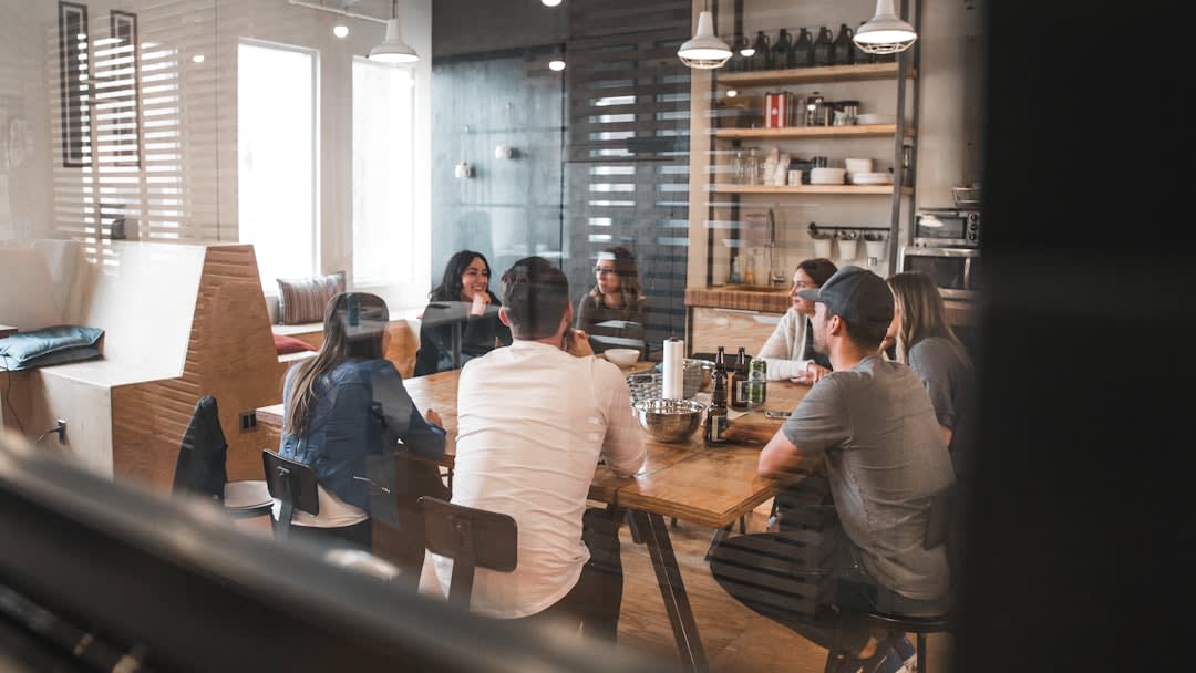 A cluttered desk representing a lack of productivity in the workplace