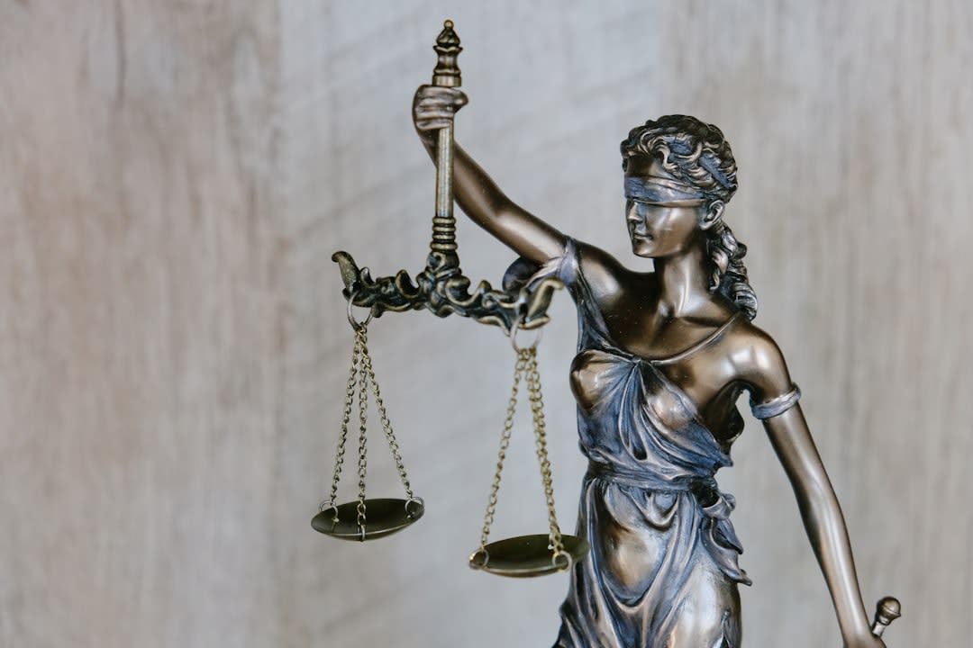 Close-up of law books and legal documents on a desk
