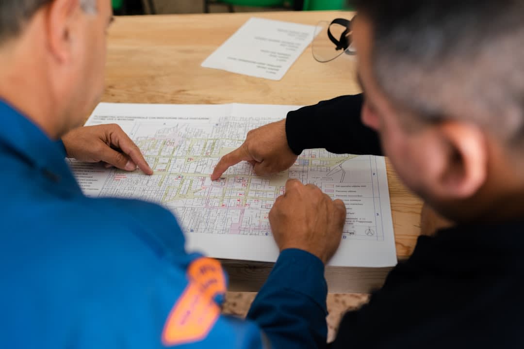 A team of engineers collaborating on a project in a tech environment.