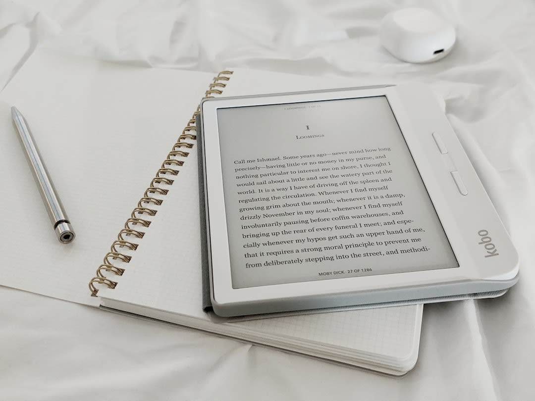 A person reading an ebook on a tablet, representing new reading habits