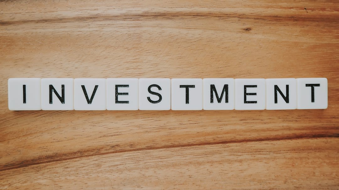 A financial advisor discussing investment strategies with a digital interface