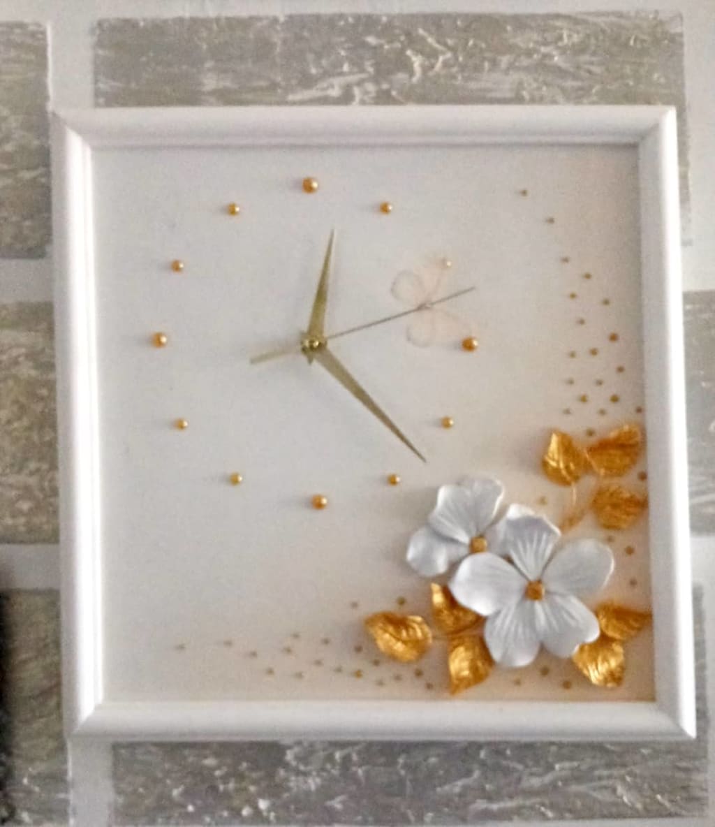 ხელნაკეთი კედლის საათი 