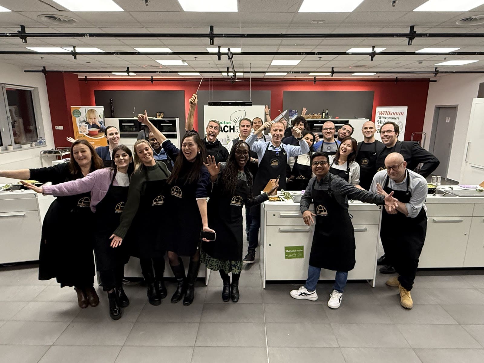 Teams cooking together at Kachatelier professional kitchen in Luxembourg
