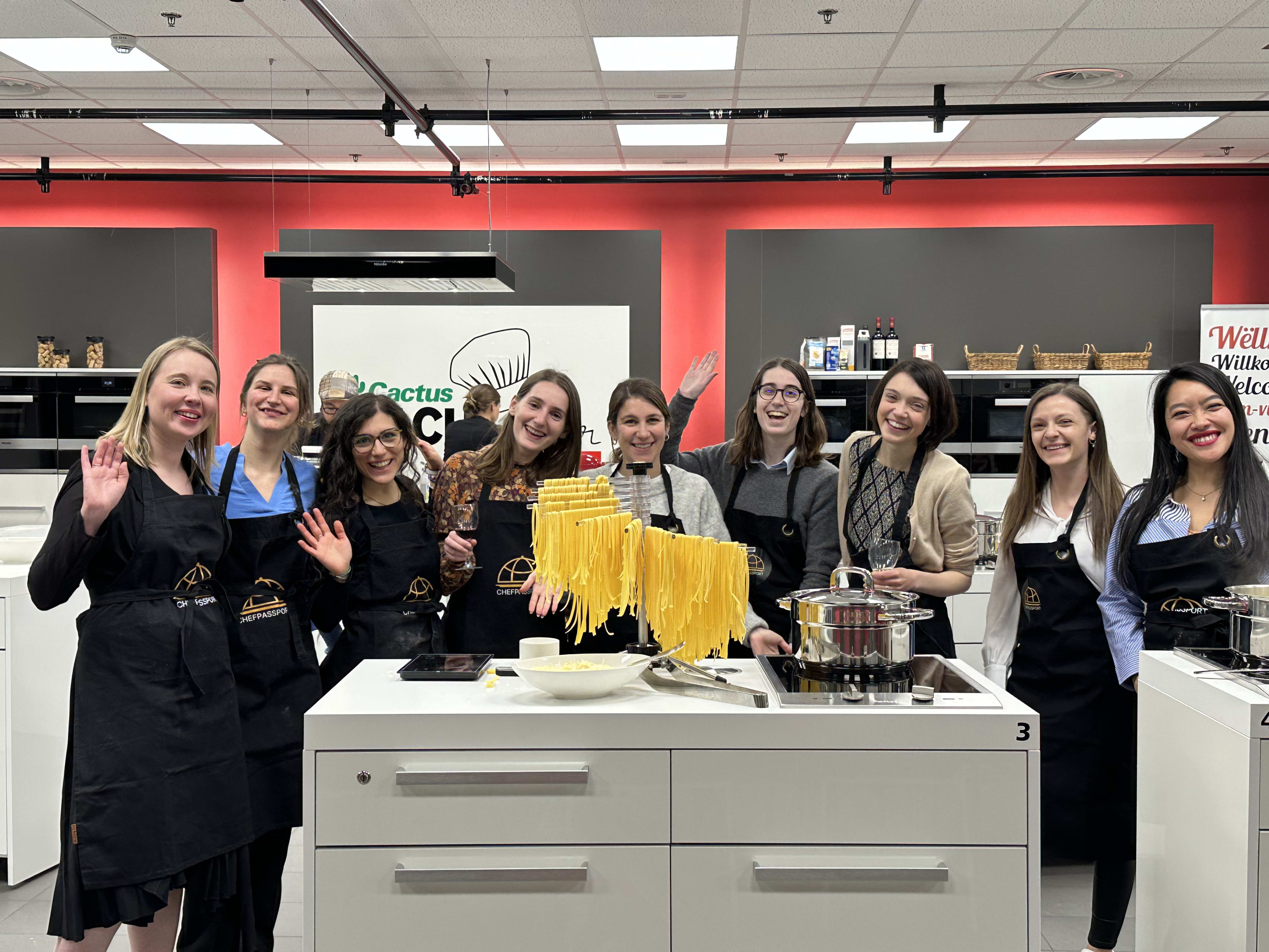 Women cooking together during team building event at Kachatelier