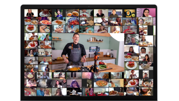 Virtual cooking class with a professional chef instructor on screen