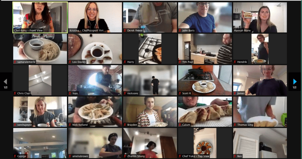 A happy remote team enjoying a ChefPassport virtual cooking class together. Virtual Team Events With Kits. Kits Building Kits