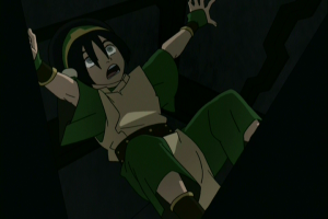 Toph trapped in a metal prison.