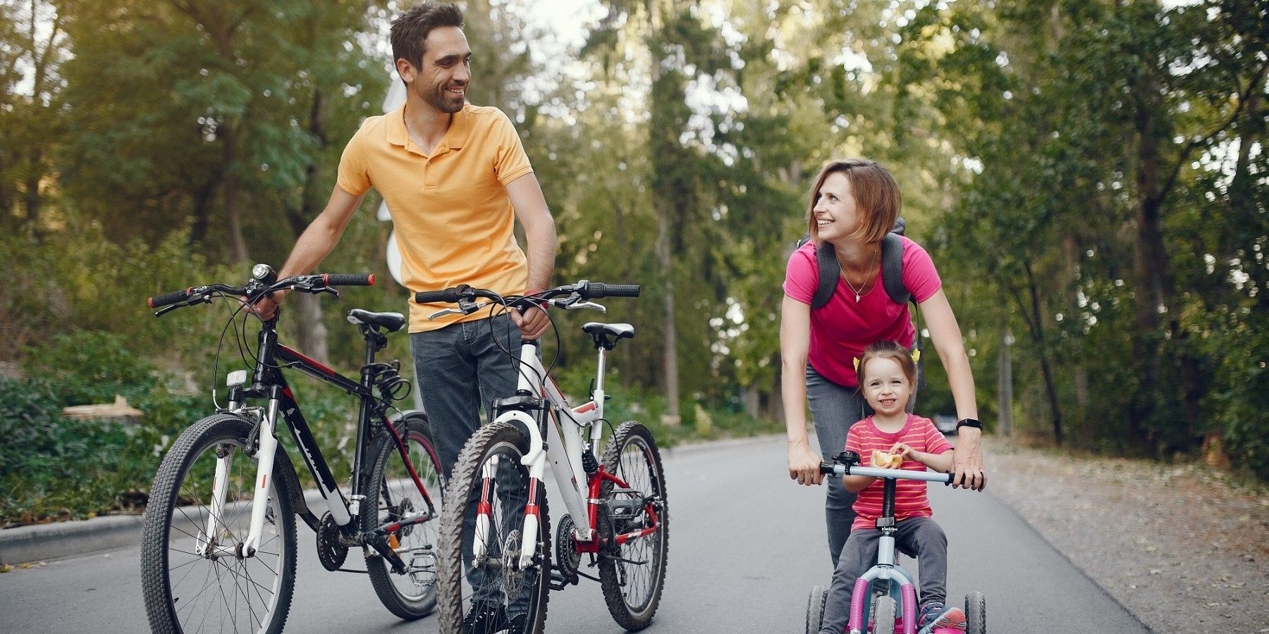 family-with-a-bicycle-in-a-summer-park.jpg