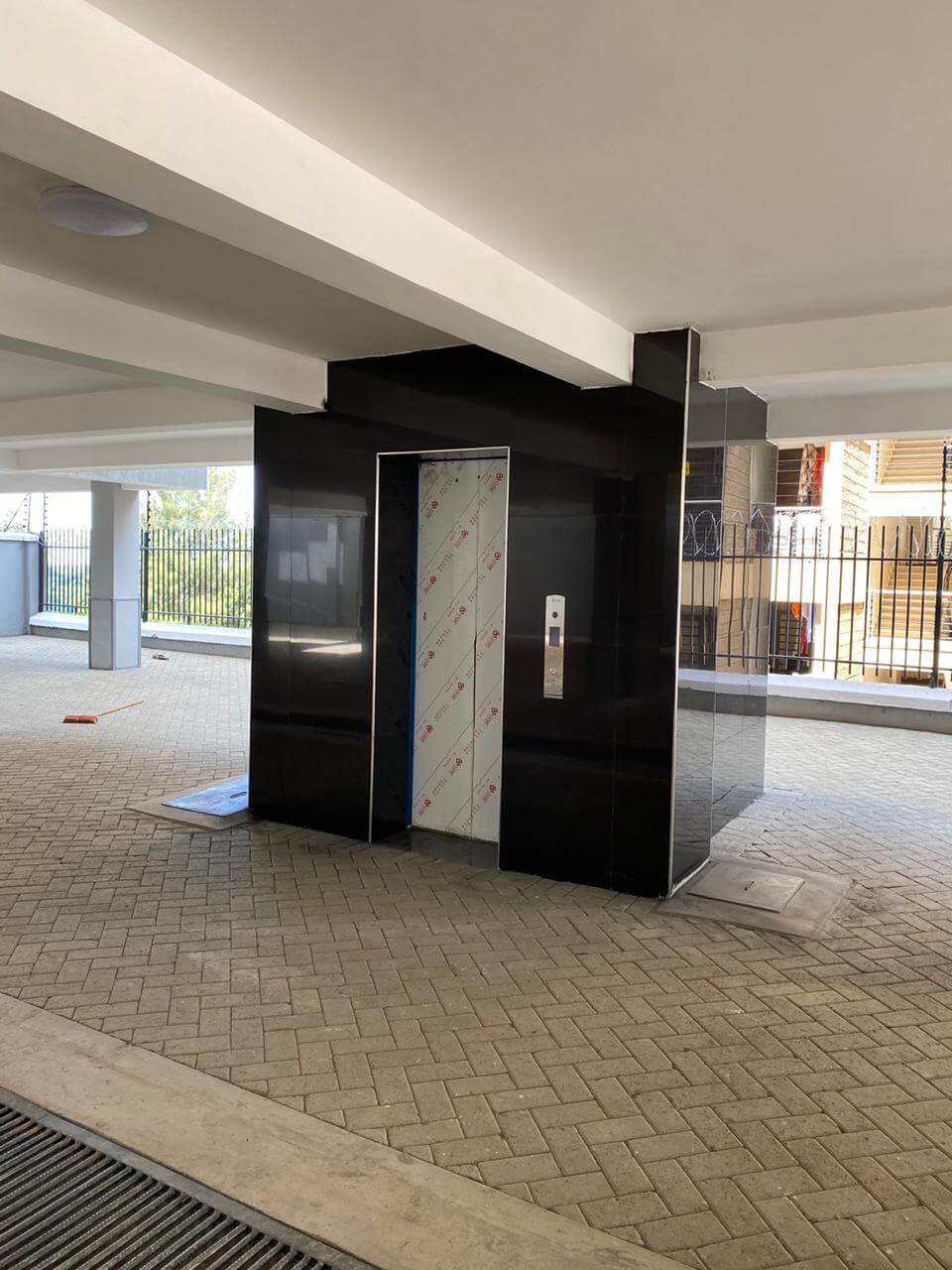 grandville luxury apartments phase 2 elevator lobby on the parking area