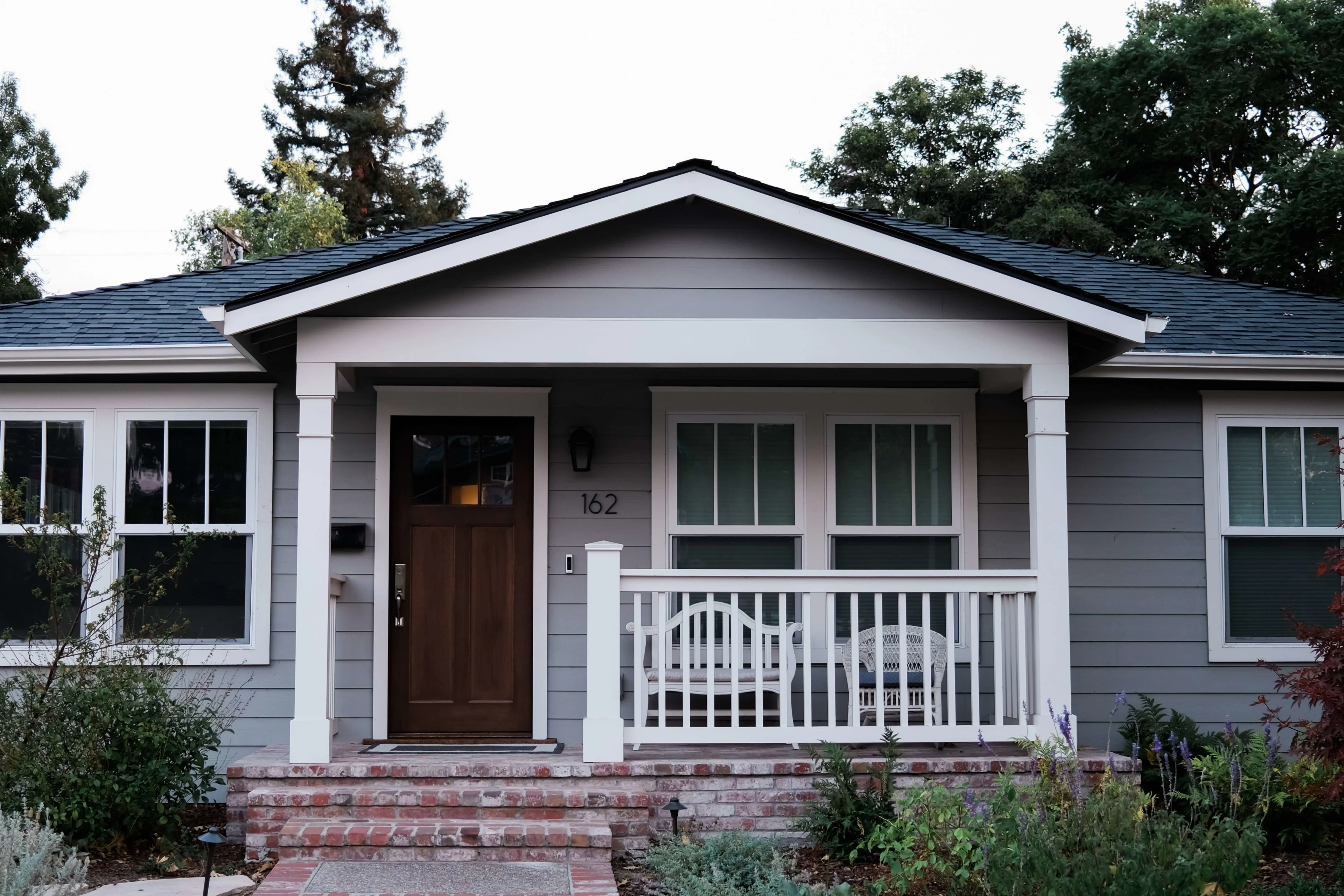 blue and gray craftsman style home