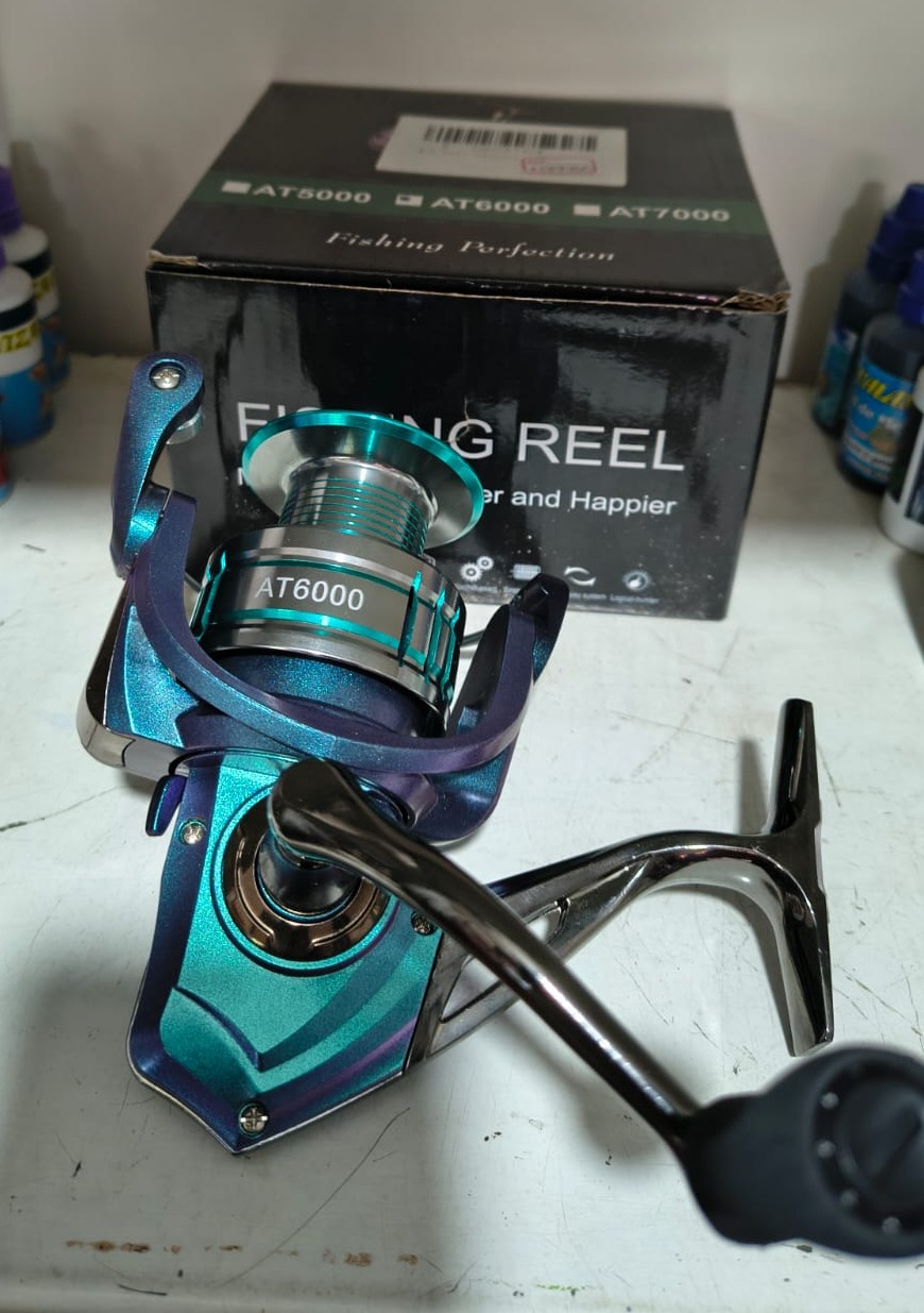CARRETE PARA PESCA AT-6000 MARCA HAUT TON, MODELO GALAXI — imagen 1