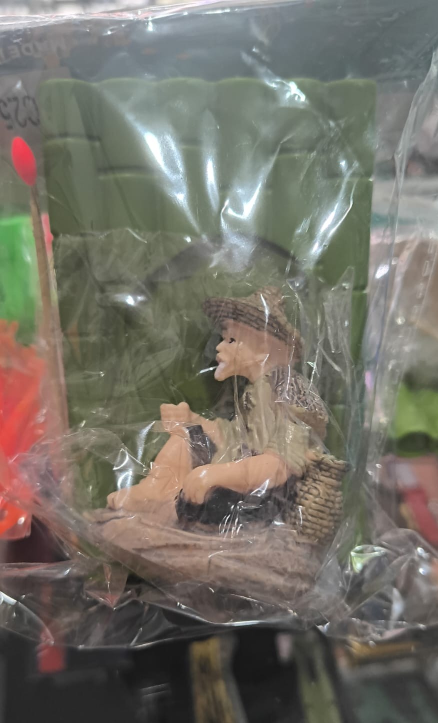 PESCADOR EN BALSA