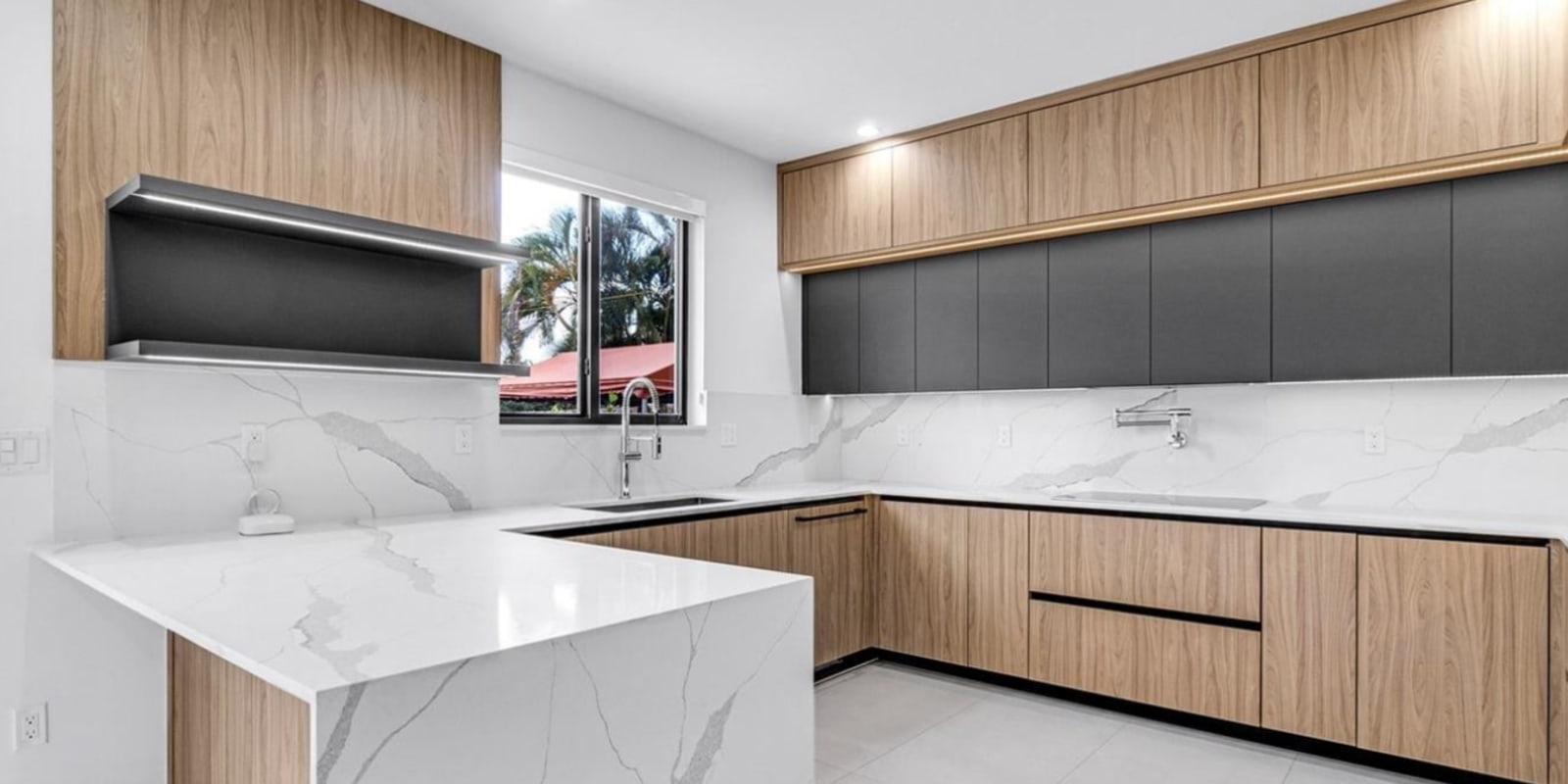 Contemporary Kitchen Remodel in Coral Gables, FL by Improvement Value Group Corp. project photo
