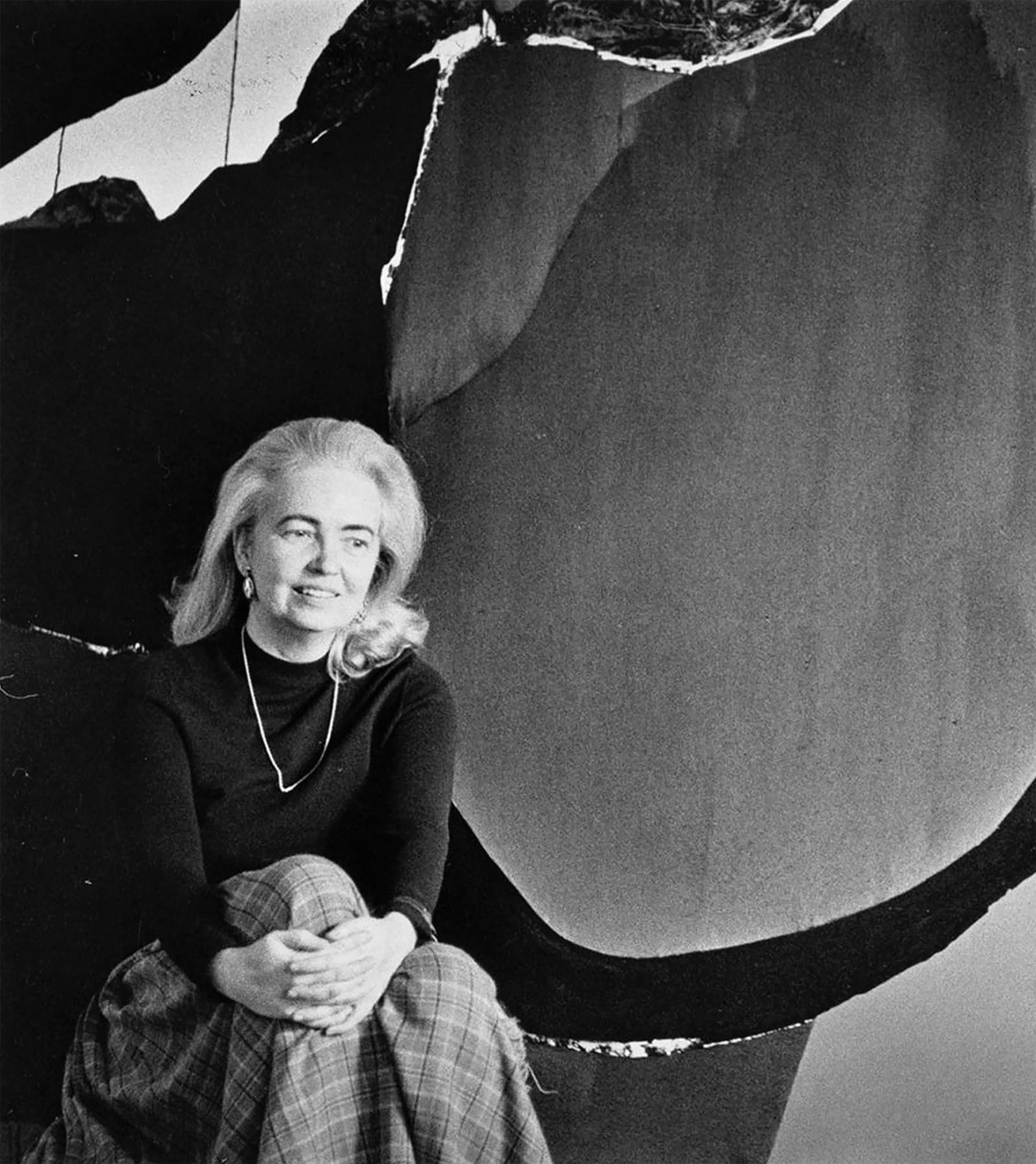 Dorothy Hood in front of Subterranean Illuminations, c. 1976, photograph courtesy of Meredith Long & Co. © Estate of Dorothy Hood