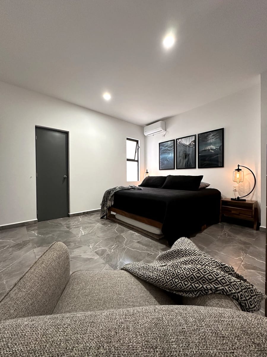 Bedroom with king bed and bedside lamps