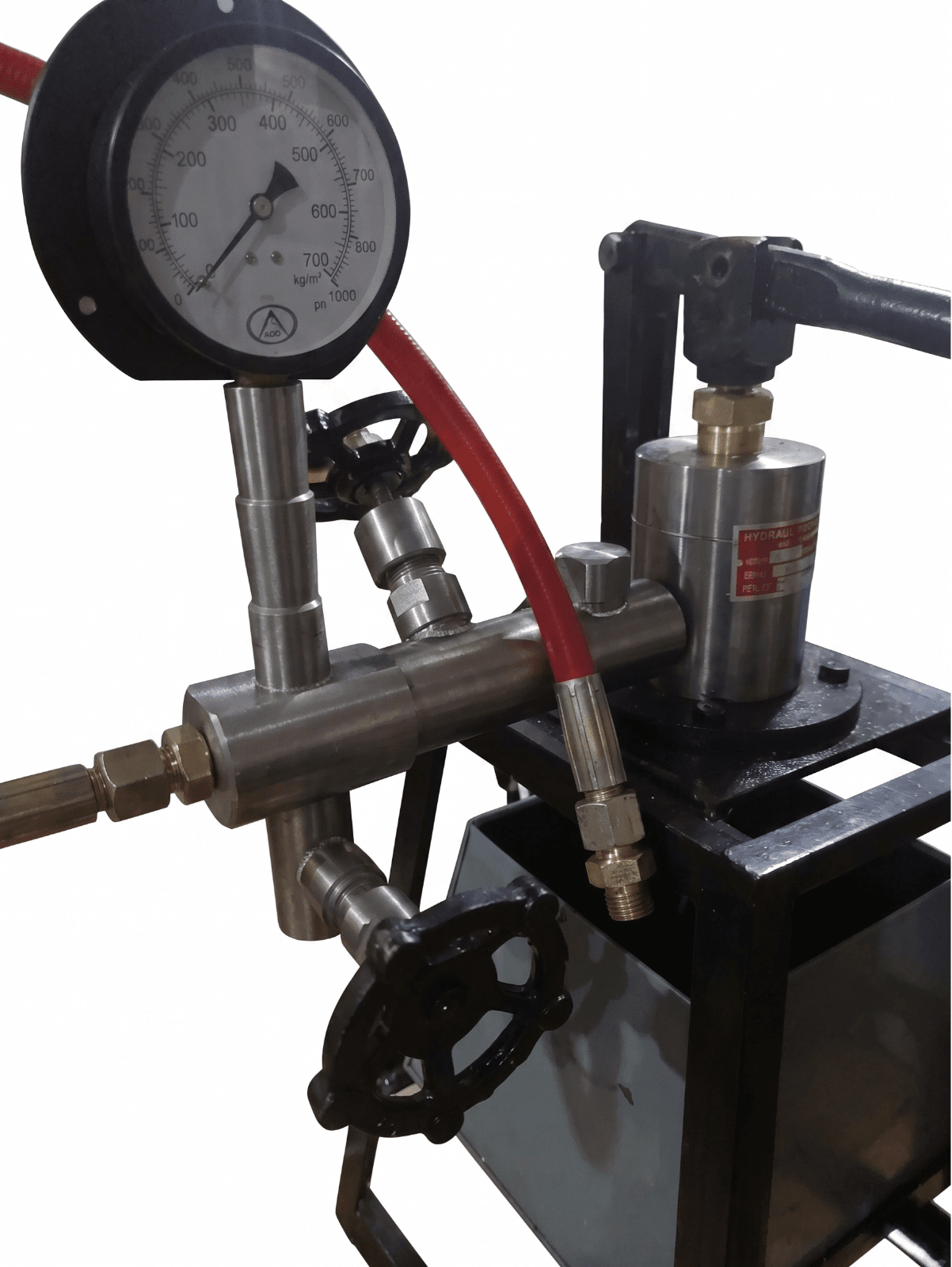 Close-up of the ME-700 hydraulic test pump pressure gauge and valve assembly, showcasing the industrial build quality provided by Hirani Marketing Combines.