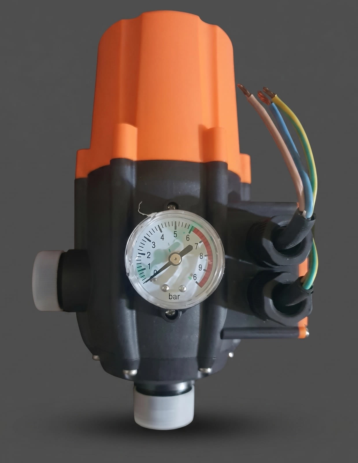 Close-up view of the pressure gauge and wiring connections on the BTALI BT-13 Automatic Pump Controller from Hirani Marketing Combines.