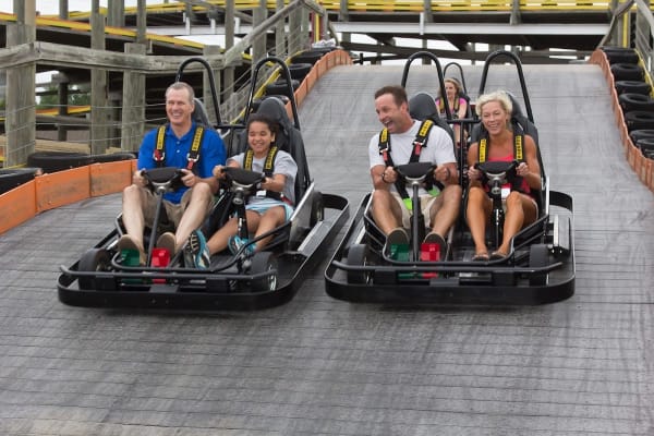 Go-kart racing track with colorful lights