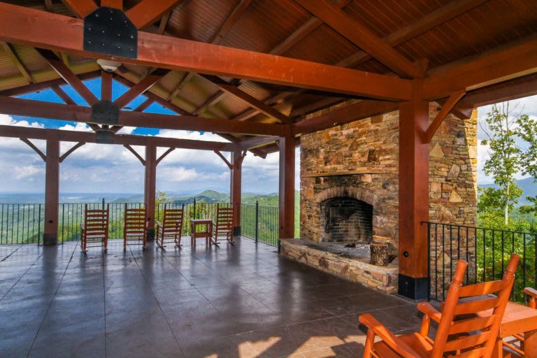 Covered pavilion with stone fireplace and panoramic mountain views