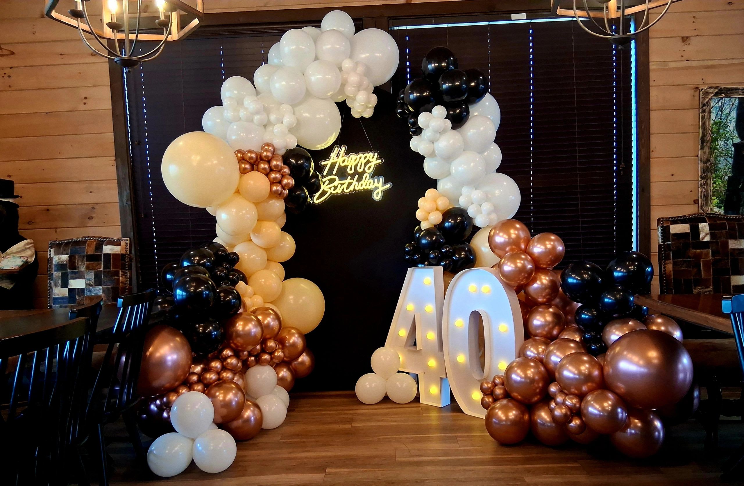 Balloon decor celebration setup at a Smoky Mountain cabin